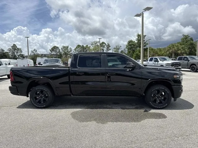 2026 RAM 1500 Big Horn in Diamond Black Crystal Pearlcoat — front three-quarter view