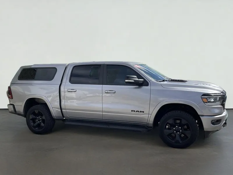 2022 RAM 1500 Laramie in Billet Silver Metallic Clearcoat — front three-quarter view