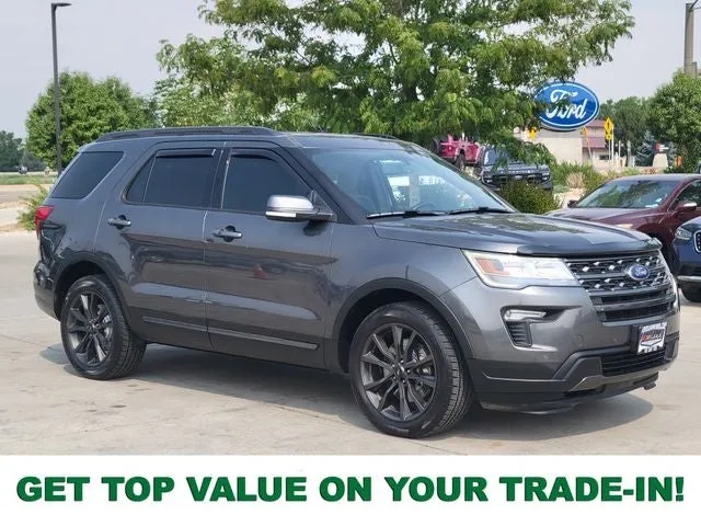2018 Ford Explorer XLT in Gray Metallic — front three-quarter view