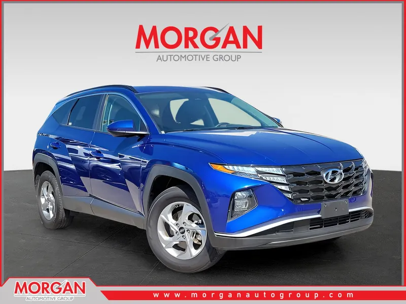 2024 Hyundai Tucson SEL in Intense Blue — front three-quarter view