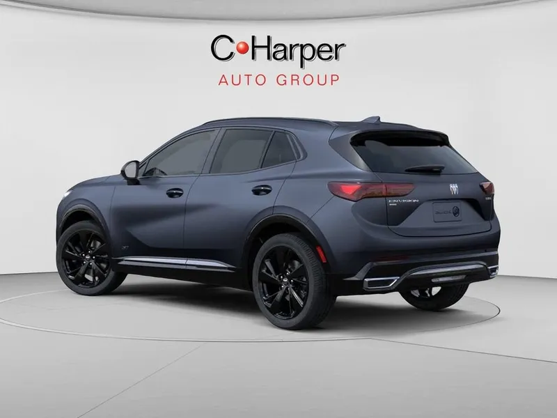2026 Buick Envision Sport Touring in Quartz Blue Metallic — front three-quarter view