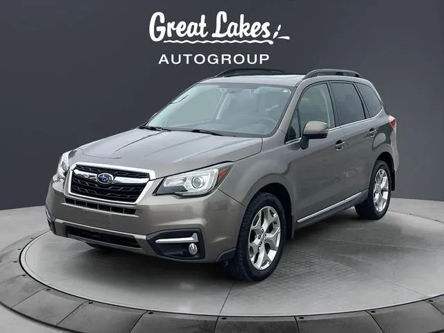 2018 Subaru Forester 2.5i Touring in Sepia Bronze Metallic — front three-quarter view