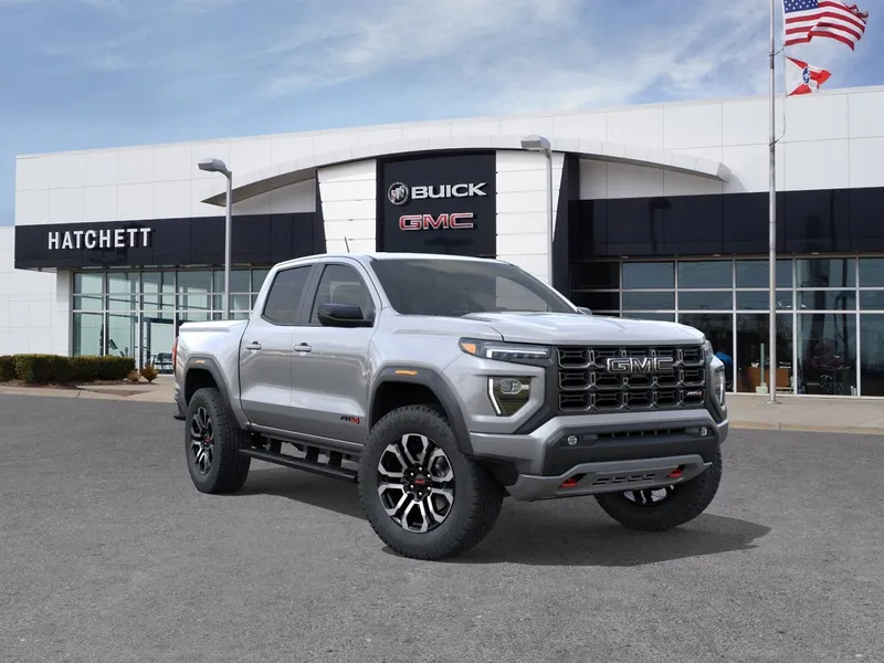 2026 GMC Canyon AT4 in Sterling Metallic — front three-quarter view