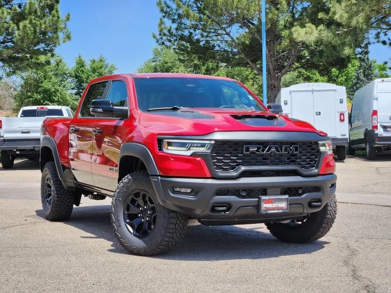 2026 RAM 1500 RAM 1500 RHO CREW CAB 4X4 5'7' BOX in Molten Red Pearl-Coat Exterior Paint — front three-quarter view