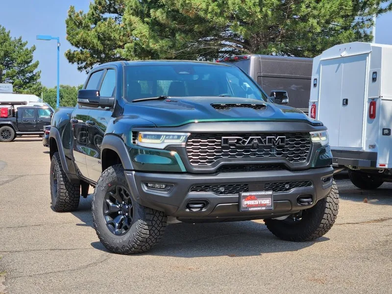 2026 RAM 1500 RAM 1500 RHO CREW CAB 4X4 5'7' BOX in Serrano-Green Metallic Exterior Paint — front three-quarter view