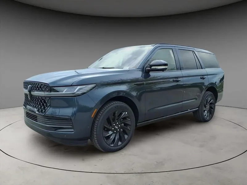 2025 Lincoln Navigator Reserve in Blue Metallic — front three-quarter view