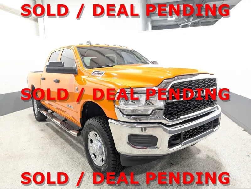 2019 RAM 2500 Tradesman Crew Cab 4x4 6'4" Box in Orange — front three-quarter view