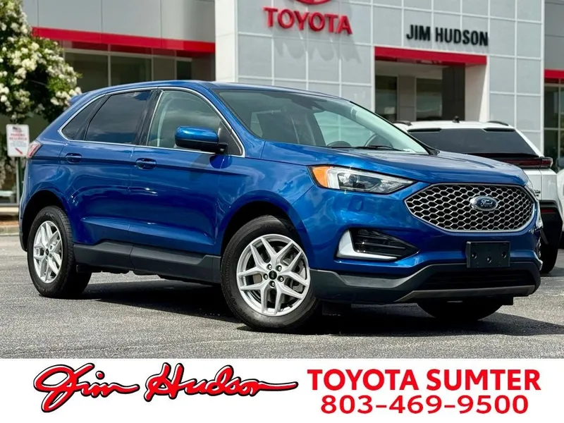 2024 Ford Edge SEL in Blue Metallic — front three-quarter view