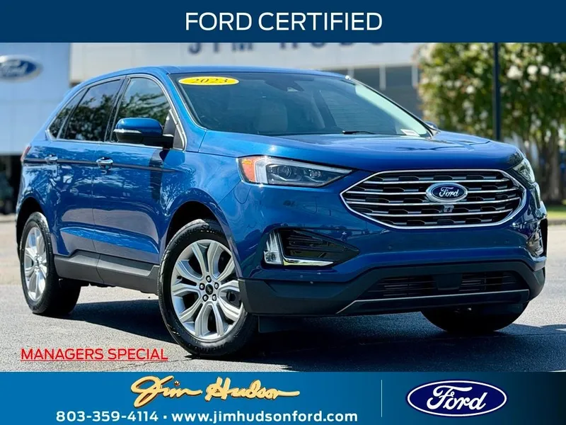 2023 Ford Edge Titanium GOLD CERTIFIED PANO ROOF TECH PACKAGE in Blue Metallic — front three-quarter view