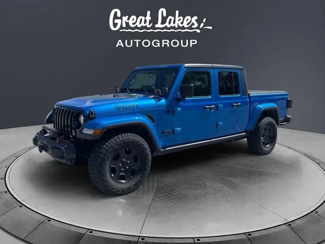 2021 Jeep Gladiator Willys in Hydro Blue Pearlcoat — front three-quarter view