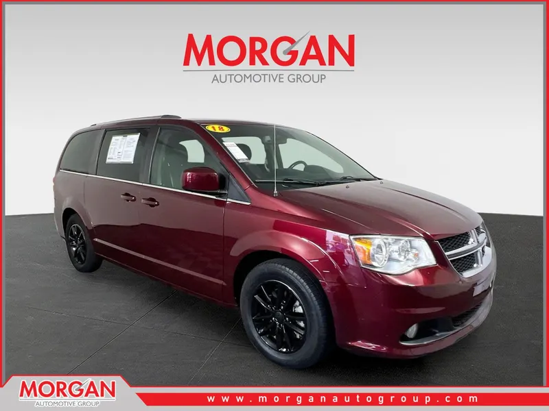 2018 Dodge Grand Caravan SXT in Octane Red Pearlcoat — front three-quarter view