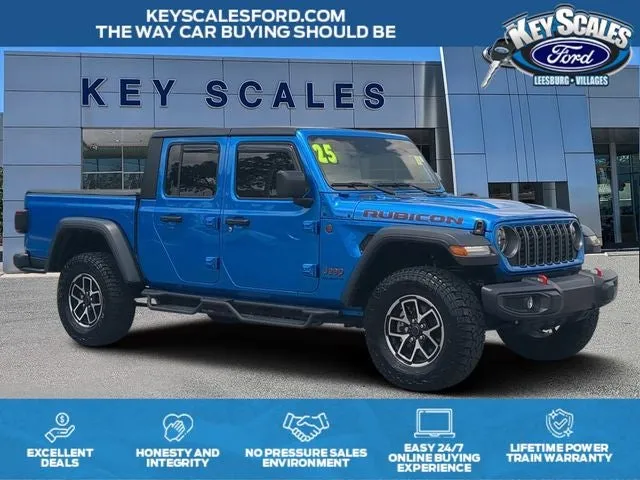 2025 Jeep Gladiator Rubicon in Blue Pearl — front three-quarter view
