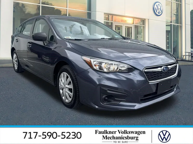 2017 Subaru Impreza 2.0i 5-door CVT in Carbide Gray Metallic — front three-quarter view