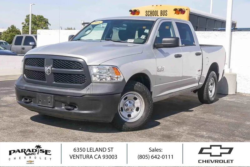 2018 RAM 1500 Tradesman in Bright Silver Met — front three-quarter view