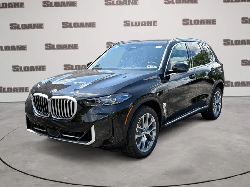 2026 BMW X5 xDrive40i in Black Sapphire Metallic — front three-quarter view
