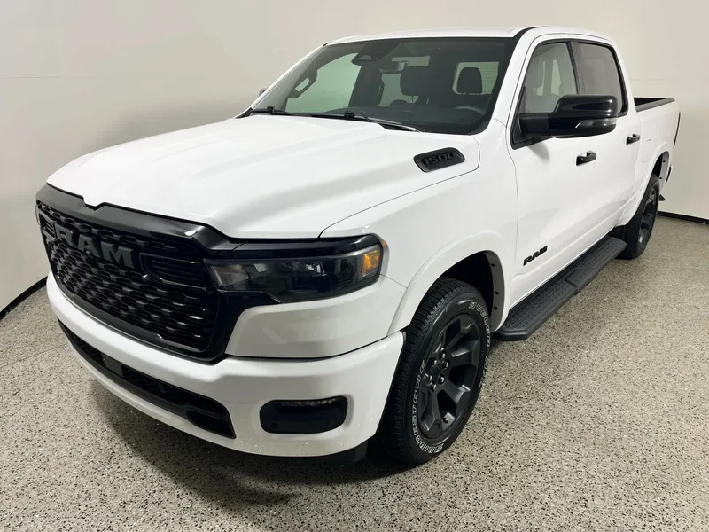 2025 RAM 1500 Big Horn in Bright White Clearcoat — front three-quarter view