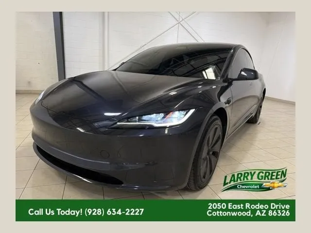 2025 Tesla Model 3 Long Range in Black — front three-quarter view
