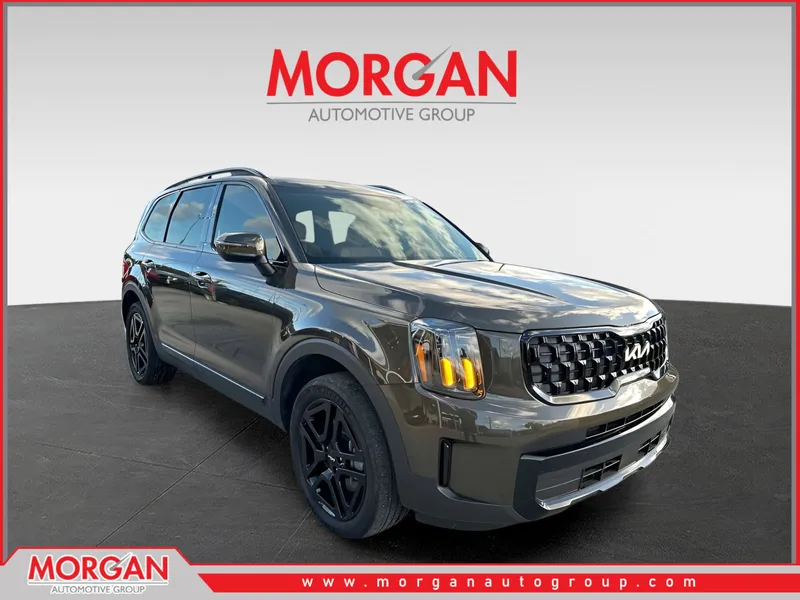 2024 Kia Telluride EX X-Line in Dark Moss — front three-quarter view