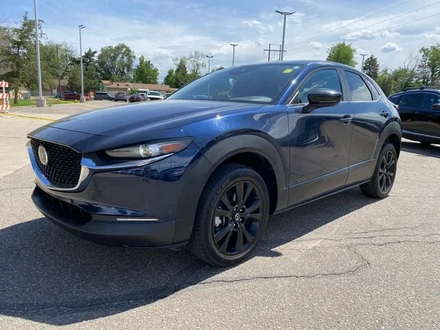 2024 Mazda Mazda CX-30 2.5 S Select Sport in Deep Crystal Blue Mica — front three-quarter view