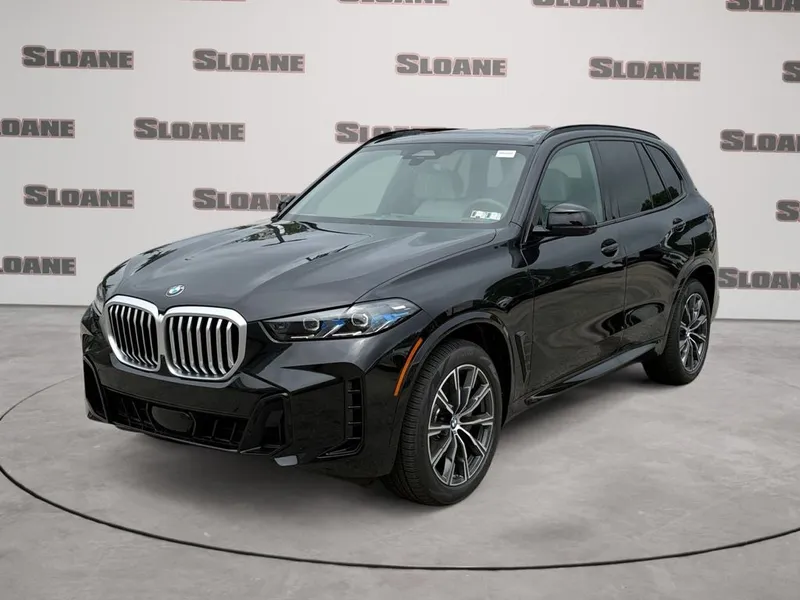 2026 BMW X5 xDrive40i in Black Sapphire Metallic — front three-quarter view