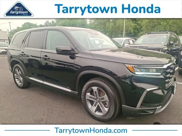 2023 Honda Pilot EX-L 7 Passenger in Crystal Black Pearl — front three-quarter view