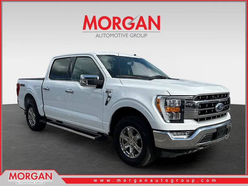 2023 Ford F-150 LARIAT in Oxford White — front three-quarter view