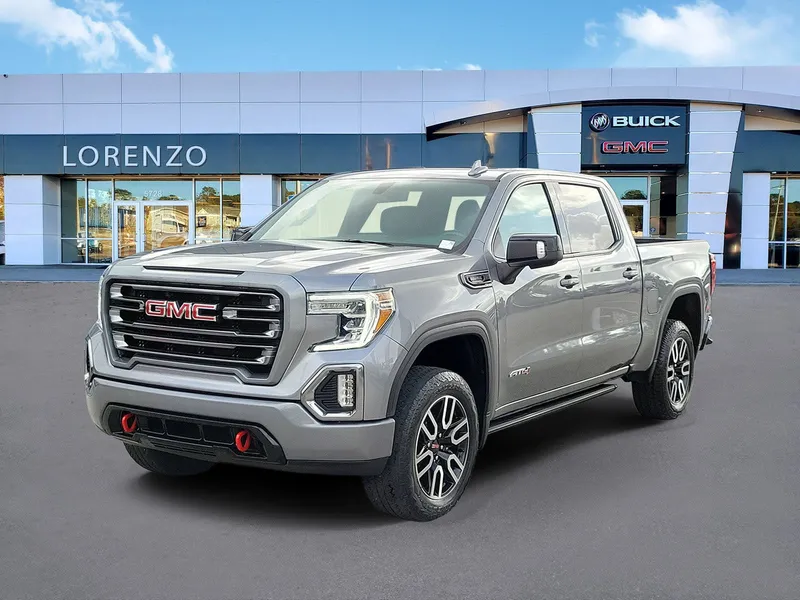 2021 GMC Sierra 1500 AT4 in Satin Steel Metallic — front three-quarter view