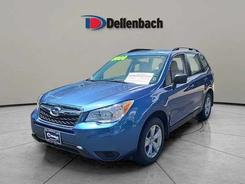 2016 Subaru Forester 2.5i in Quartz Blue Pearl — front three-quarter view