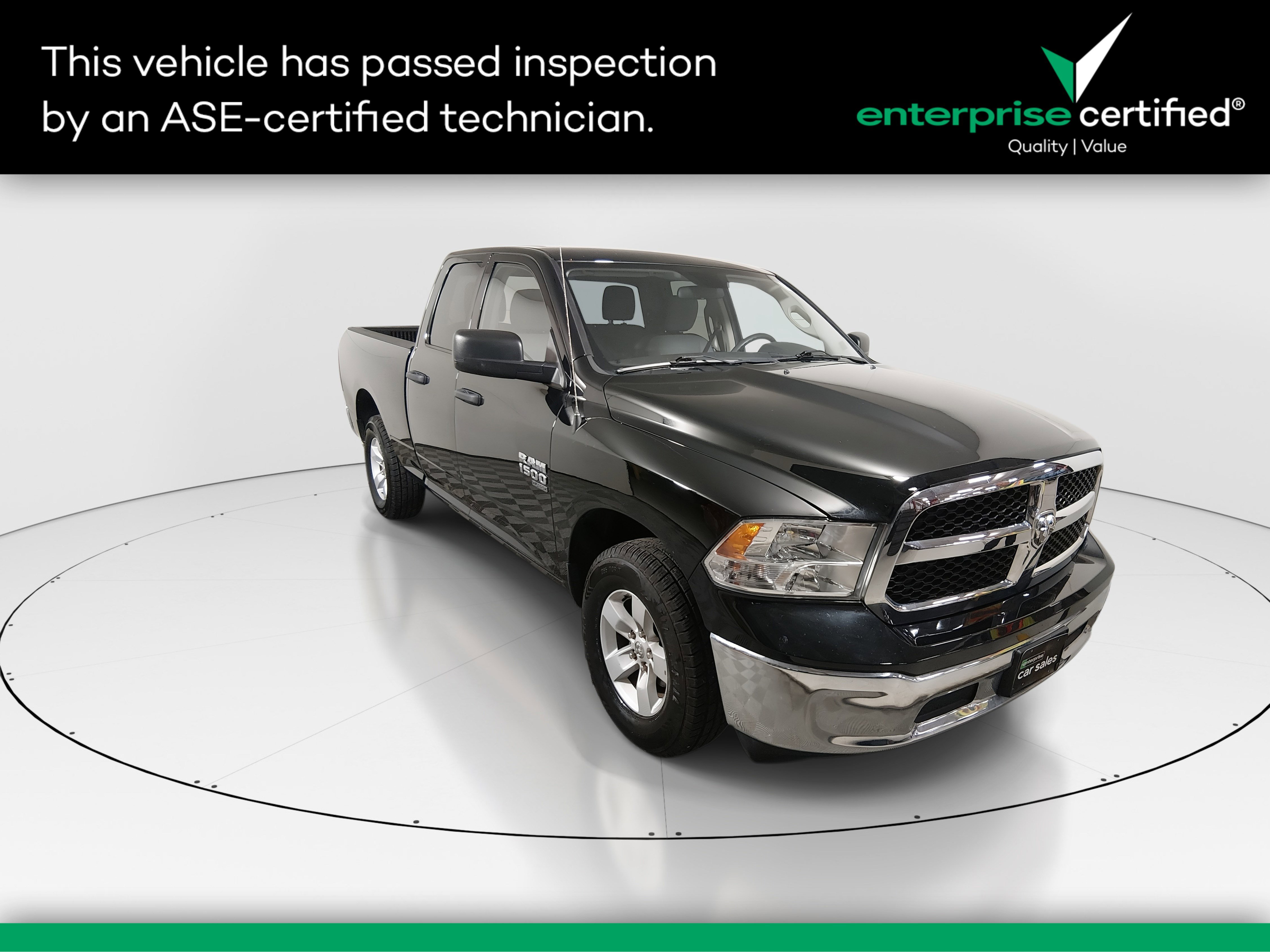 2024 Ram 1500 Classic SLT 4x4 Quad Cab 6'4" Box — front three-quarter view
