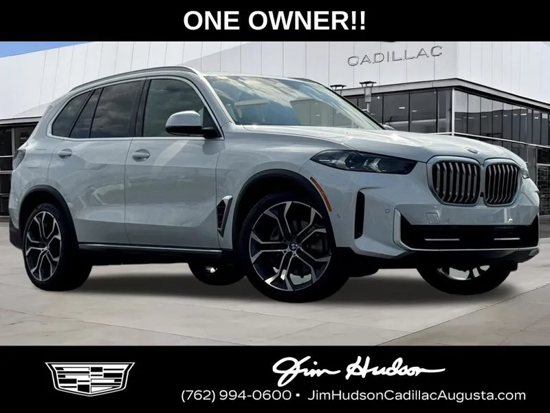 2024 BMW X5 xDrive40i in White Metallic — front three-quarter view