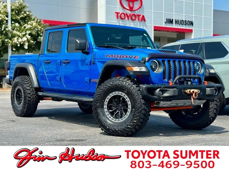 2022 Jeep Gladiator Mojave in Hydro Blue Pearlcoat — front three-quarter view