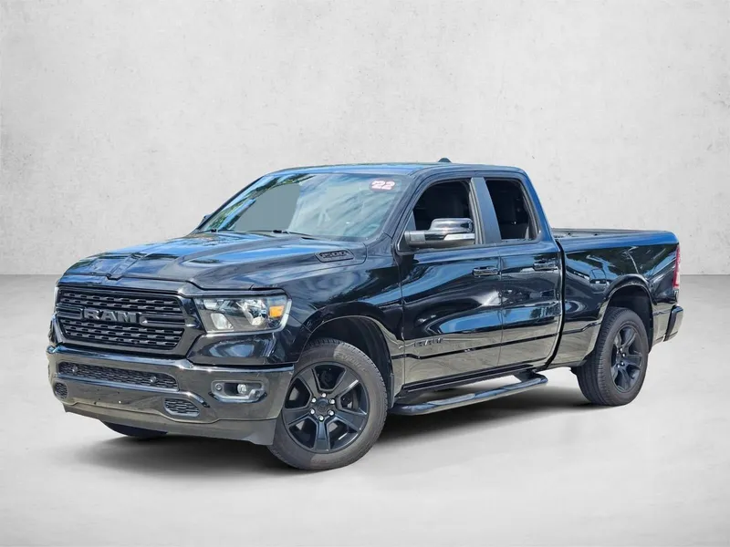 2022 RAM 1500 Big Horn 4x2 Quad Cab 6'4" Box in Diamond Black Crystal Pearlcoat — front three-quarter view