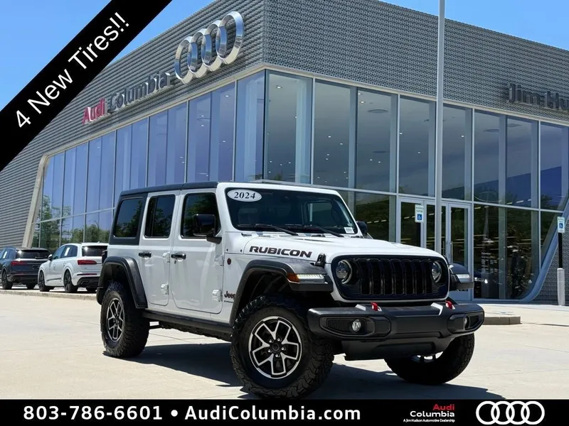 2024 Jeep Wrangler Rubicon in Bright White Clearcoat — front three-quarter view