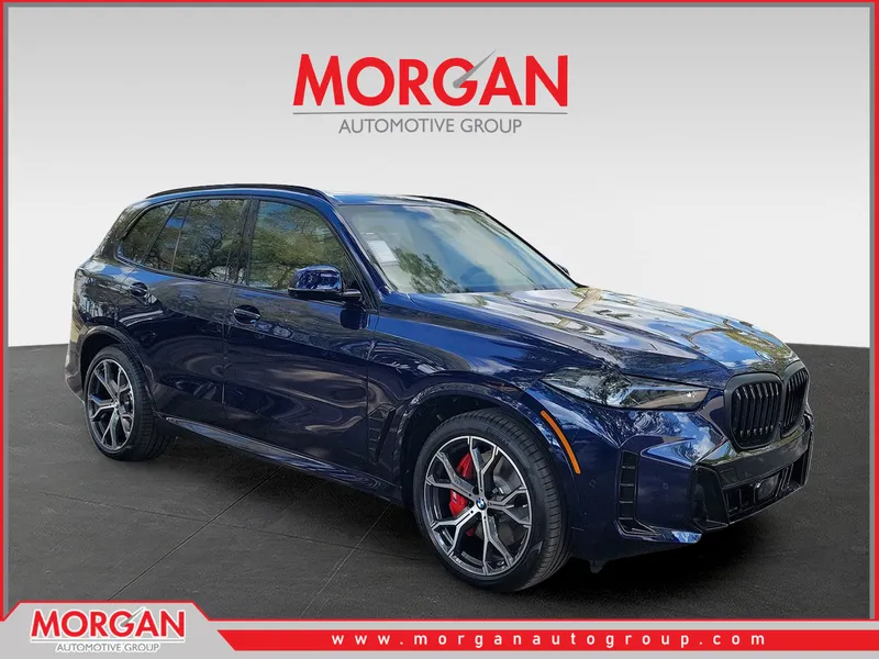 2026 BMW X5 xDrive50e in Tanzanite Blue II Metallic — front three-quarter view