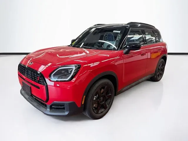 2027 MINI COUNTRYMAN SIGNATURE PLUS in Chili Red II — front three-quarter view