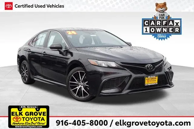 2024 Toyota Camry SE in Black — front three-quarter view