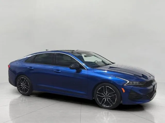 2023 Kia K5 GT in Sapphire Blue — front three-quarter view