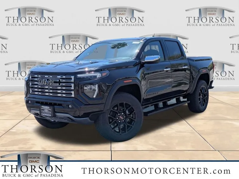 2026 GMC Canyon Denali in Onyx Black — front three-quarter view