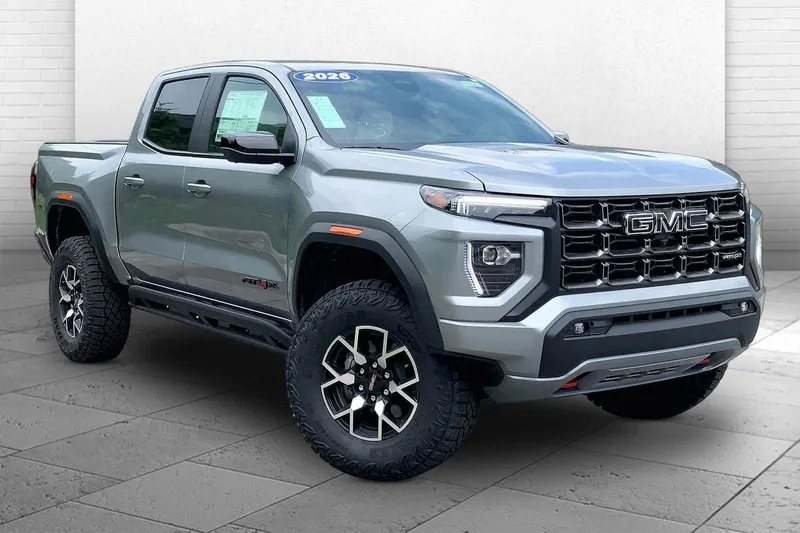 2026 GMC Canyon AT4X in Sterling Metallic — front three-quarter view