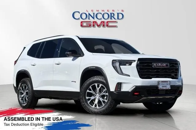 2026 GMC Acadia AT4 in Summit White — front three-quarter view