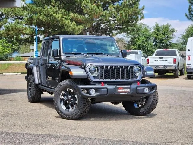2026 Jeep Gladiator GLADIATOR RUBICON X 4X4 in Granite Crystal Metallic Clear-Coat Exterior Paint — front three-quarter view