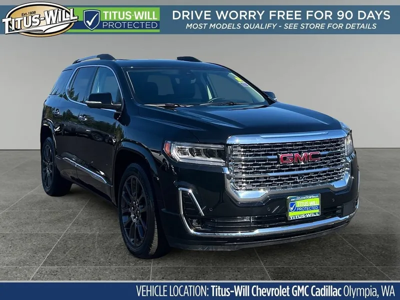 2023 GMC Acadia Denali in Ebony Twilight Metallic — front three-quarter view