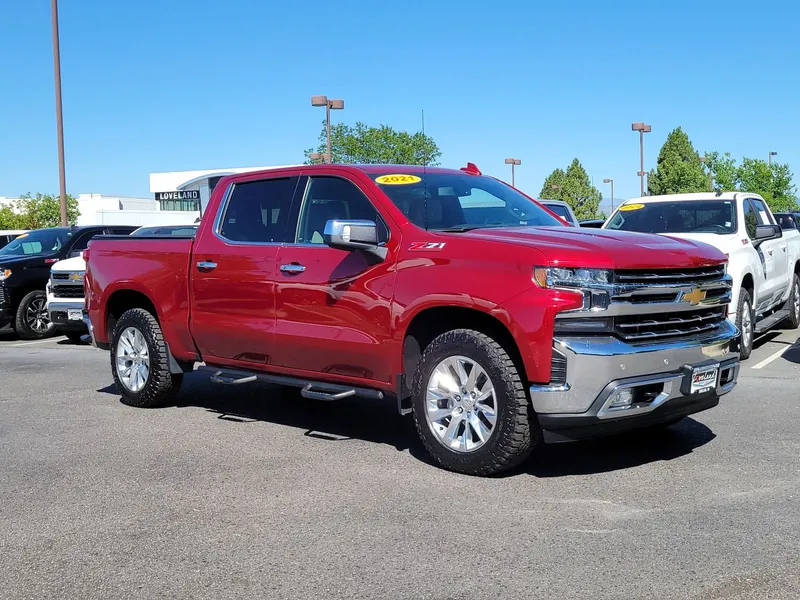 2021 Chevrolet Silverado 1500 LTZ in Cherry Red Tintcoat — front three-quarter view