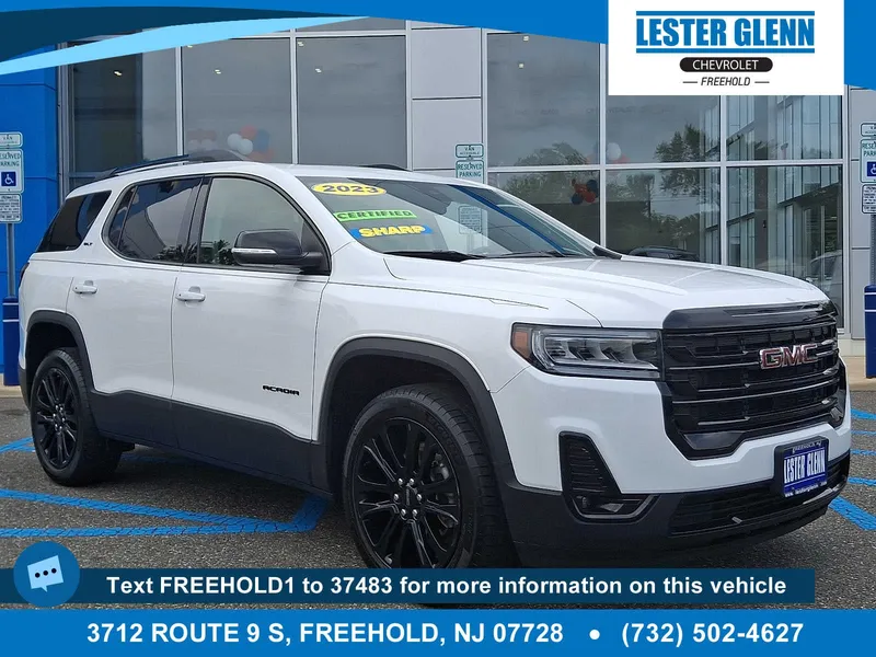 2023 GMC Acadia SLT in Summit White — front three-quarter view