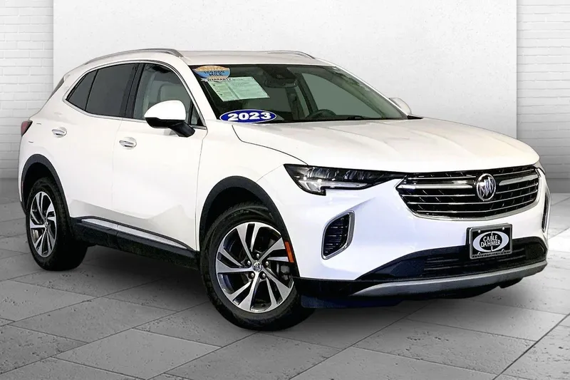 2023 Buick Envision Essence in Summit White — front three-quarter view