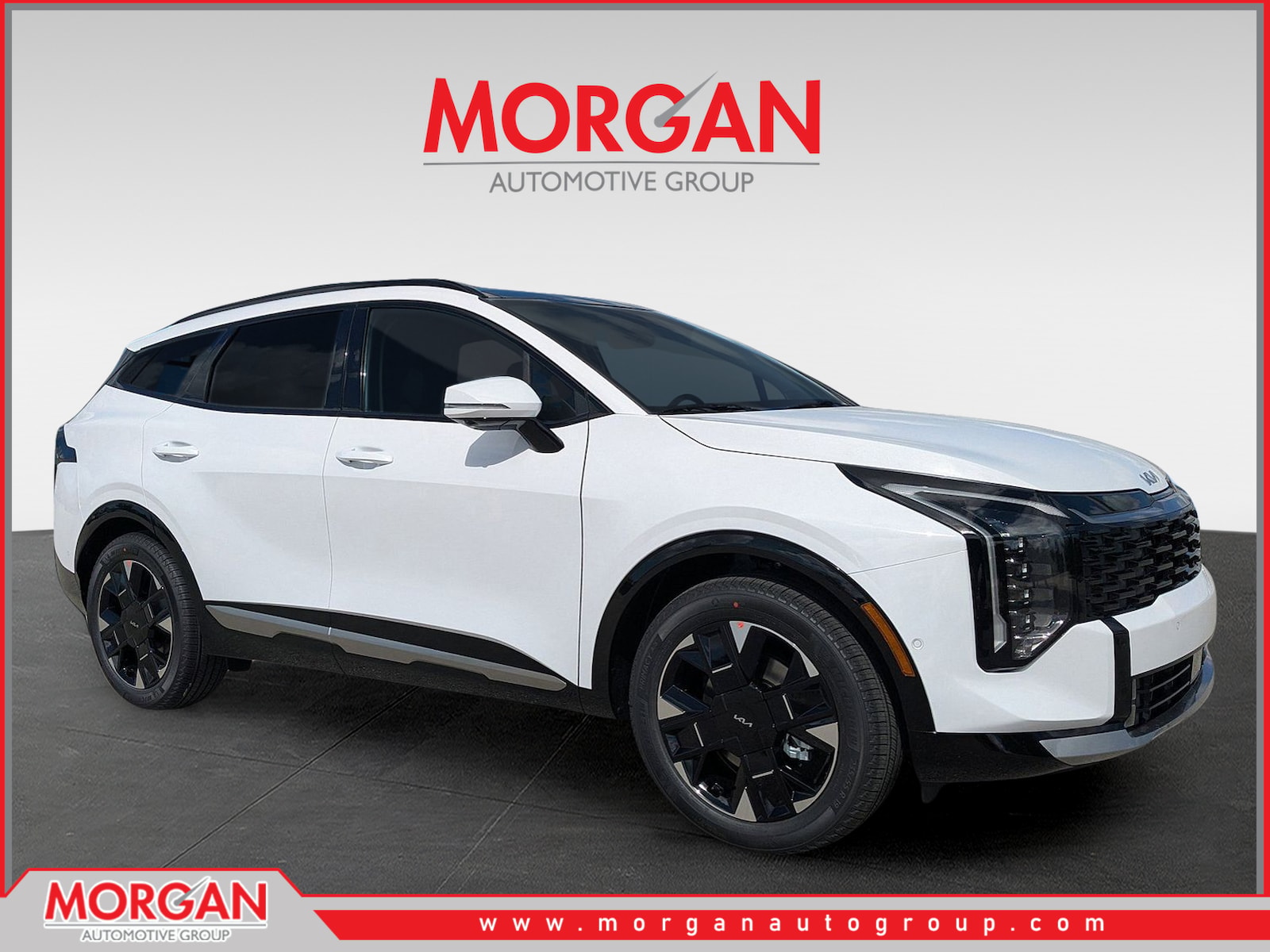 2026 Kia Sportage SX-Prestige in Glacial White Pearl — front three-quarter view