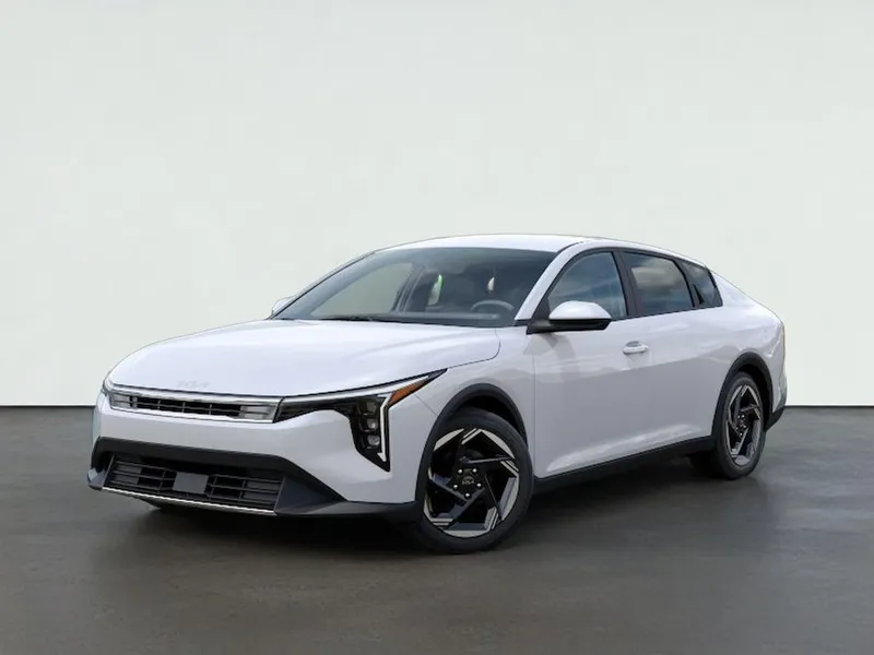 2026 Kia K4 EX in Snow White Pearl — front three-quarter view