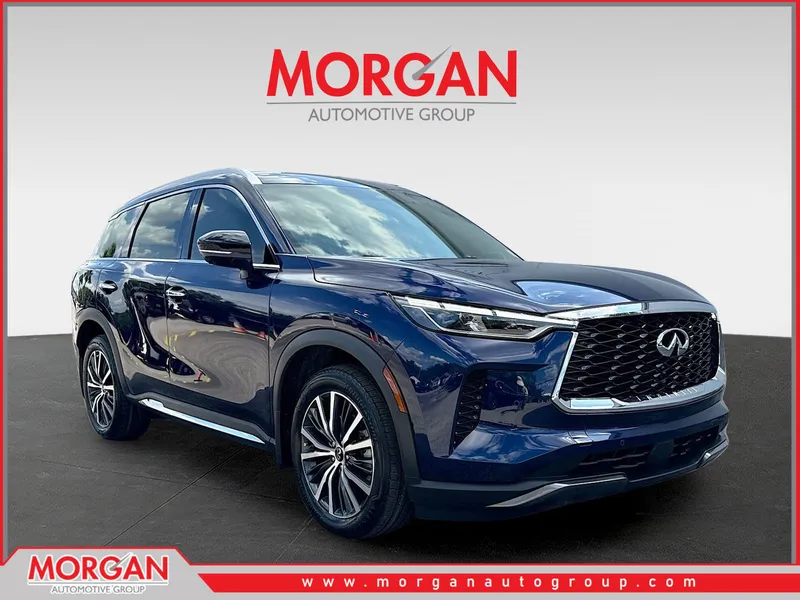2023 INFINITI QX60 SENSORY in Grand Blue — front three-quarter view