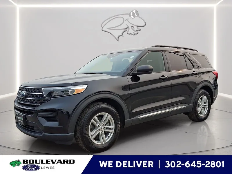 2022 Ford Explorer XLT in Agate Black — front three-quarter view