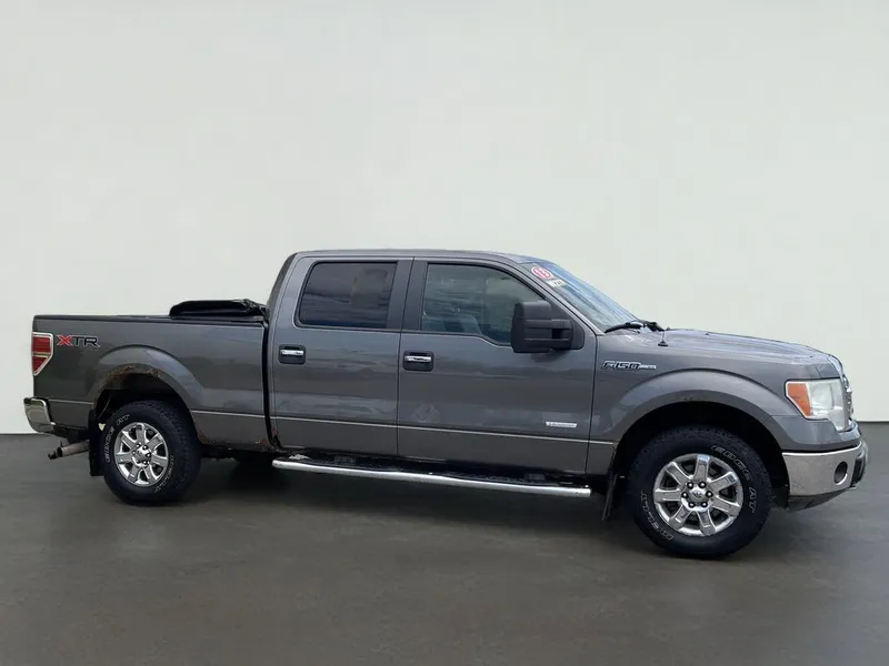 2013 Ford F-150 XLT in Gray — front three-quarter view